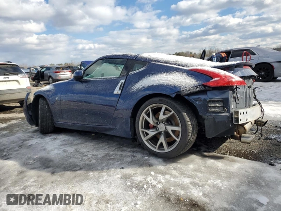 2013 Nissan 370Z z VIN JN1AZ4EH4DM383023, wystawiony jako Copart lot #88204985 z przebiegiem 138 112 mil mil oraz Szkoda całkowita • Salvage title. Historia ofert i sprzedaży dostępna na DreamBid. Obrazek 2.