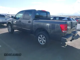 2010 Nissan Titan XE with VIN 1N6BA0EJ5AN304045, listed as a IAAI auction lot 41794718 with 297,551 mi miles. Bid and sale history available at carsss.com. Image 3.