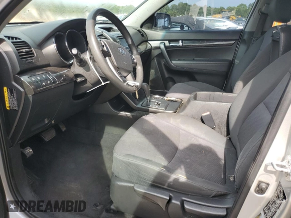 2013 Kia Sorento LX with VIN 5XYKT4A24DG339500, listed as a Copart auction lot 56302605 with 166,733 mi miles and Salvage title. Bid and sale history available at DreamBid. Image 7.