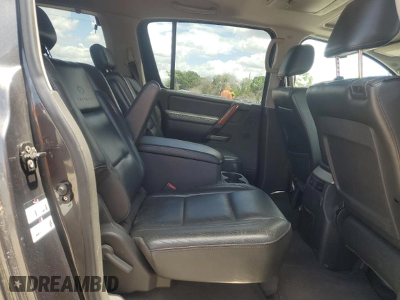 2006 Infiniti QX56 z VIN 5N3AA08A26N807620, wystawiony jako Copart lot #66207424 z przebiegiem 186 381 mil mil oraz Czysty tytuł • Clean title. Historia ofert i sprzedaży dostępna na DreamBid. Obrazek 11.