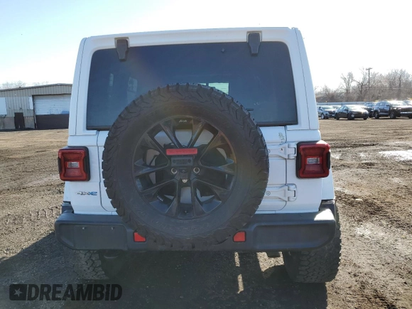 2021 Jeep Wrangler Unlimited Sahara with VIN 1C4JJXP64MW762819, listed as a Copart auction lot 49796845 with 76,543 mi miles and Salvage Title. Bid and sale history available at DreamBid. Image 6.