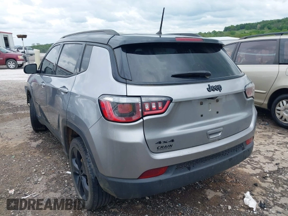 2018 Jeep Compass Latitude with VIN 3C4NJDBB8JT323967, listed as a IAAI auction lot 42096644 with 143,761 mi miles and . Bid and sale history available at DreamBid. Image 3.