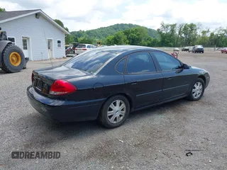 2007 Ford Taurus SEL with VIN 1FAFP56U67A123003, listed as a IAAI auction lot 42522960 with 150,000 mi miles and . Bid and sale history available at DreamBid. Image 4.