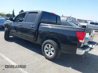 2012 Nissan Titan SV with VIN 1N6AA0EKXCN325898, listed as a IAAI auction lot 42234685 with 102,259 mi miles and . Bid and sale history available at DreamBid. Image 3.