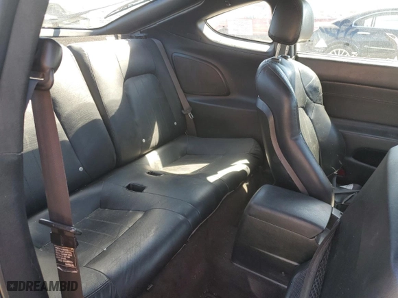 2004 Hyundai Tiburon GT with VIN KMHHN65F94U113699, listed as a Copart auction lot 53858355 with 221,999 mi miles and Salvage Title. Bid and sale history available at carsss.com. Image 10.