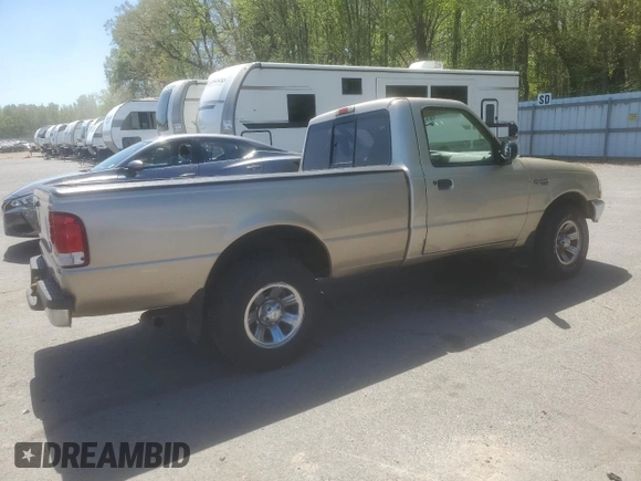 2000 Ford Ranger XL with VIN 1FTYR10V7YTA43903, listed as a Copart auction lot 54822975 with 177,187 mi miles and Salvage Title. Bid and sale history available at DreamBid. Image 3.