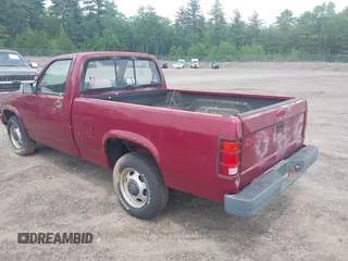 1996 Dodge Dakota z VIN 1B7FL26P3TS551971, wystawiony jako IAAI lot #42441145 z przebiegiem 131 063 mil mil oraz . Historia ofert i sprzedaży dostępna na DreamBid. Obrazek 3.