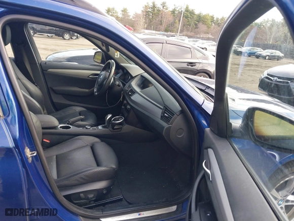 2014 BMW X1 xDrive28i with VIN WBAVL1C58EVY24491, listed as a IAAI auction lot 42022672 with 115,123 mi miles. Bid and sale history available at carsss.com. Image 5.