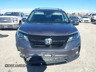 2022 Honda Pilot Special Edition with VIN 5FNYF5H27NB013972, listed as a IAAI auction lot 41219766 with 52,291 mi miles and . Bid and sale history available at carsss.com. Image 12.