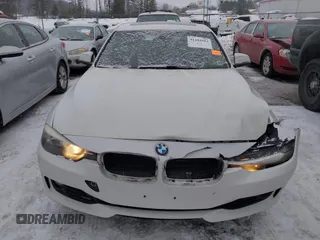 2014 BMW 3 Series 328i with VIN WBA3C1C51EK106435, listed as a IAAI auction lot 41202983 with 142,135 mi miles. Bid and sale history available at carsss.com. Image 6.