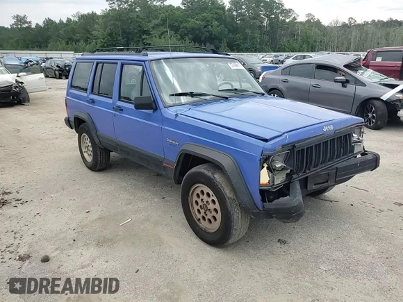 1996 Jeep Cherokee Sport z VIN 1J4FT68S8TL128381, wystawiony jako Copart lot #57496175 z przebiegiem 221 330 mil mil oraz Szkoda całkowita • Salvage title. Historia ofert i sprzedaży dostępna na DreamBid. Obrazek 14.