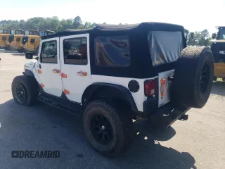 2014 Jeep Wrangler Unlimited Rubicon with VIN 1C4BJWFG4EL325544, listed as a Copart auction lot 61966025 with 149,162 mi miles and Salvage title. Bid and sale history available at DreamBid. Image 2.