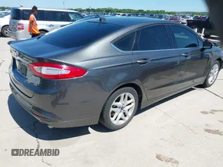 2015 Ford Fusion SE with VIN 3FA6P0H77FR160172, listed as a IAAI auction lot 42088402 with 175,360 mi miles. Bid and sale history available at carsss.com. Image 4.