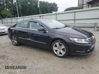 2014 Volkswagen CC R-Line with VIN WVWBP7AN3EE533333, listed as a Copart auction lot 66396174 with 124,323 mi miles and Clean Title. Bid and sale history available at carsss.com. Image 4.