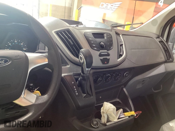 2019 Ford Transit z VIN 1FTYR2CM1KKA32062, wystawiony jako IAAI lot #42596475 z przebiegiem 151 369 mil mil oraz . Historia ofert i sprzedaży dostępna na DreamBid. Obrazek 23.