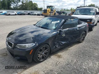 2016 BMW 2 Series M235i with VIN WBA1M1C52GV394388, listed as a Copart auction lot 73257804 with 87,391 mi miles and Salvage Title. Bid and sale history available at carsss.com. Image 1.
