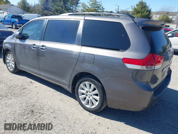 2012 Toyota Sienna XLE with VIN 5TDDK3DC5CS047530, listed as a IAAI auction lot 41780049 with 209,812 mi miles. Bid and sale history available at carsss.com. Image 3.