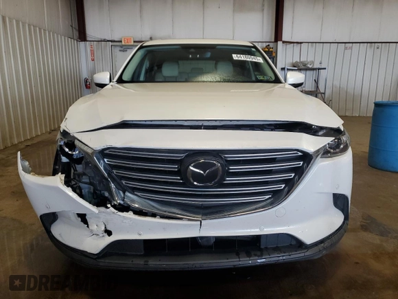 2019 Mazda CX-9 Touring with VIN JM3TCBCY3K0317900, listed as a Copart auction lot 64180945 with 63,721 mi miles and Salvage title. Bid and sale history available at DreamBid. Image 5.