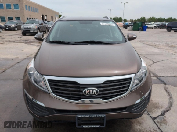 2013 Kia Sportage LX z VIN KNDPBCA29D7458904, wystawiony jako Copart lot #59175745 z przebiegiem 100 719 mil mil oraz Szkoda całkowita • Salvage title. Historia ofert i sprzedaży dostępna na DreamBid. Obrazek 5.