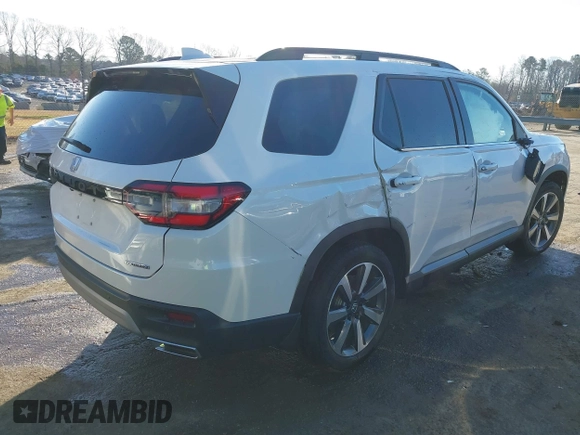 2024 Honda Pilot Touring with VIN 5FNYG2H7XRB016877, listed as a IAAI auction lot 41496013 with 18,213 mi miles and . Bid and sale history available at DreamBid. Image 4.