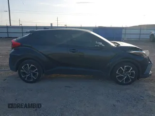 2018 Toyota C-HR XLE with VIN JTNKHMBX6J1007058, listed as a IAAI auction lot 42100587 with 71,725 mi miles and . Bid and sale history available at DreamBid. Image 14.
