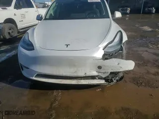 2023 Tesla Model Y Long Range with VIN 7SAYGDEE2PA120789, listed as a Copart auction lot 42927375 with 34,098 mi miles and Salvage Title. Bid and sale history available at carsss.com. Image 11.