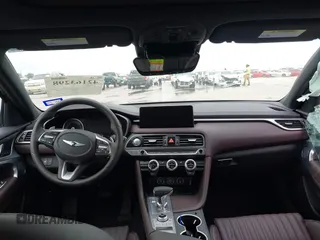 2022 Genesis G70 2.0T с VIN KMTG34TA2NU103715, выставлен на аукционе IAAI как лот 42163298 с пробегом 19 320 миль миль и . История ставок и продаж доступна на DreamBid. Изображение 5.