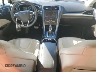 2016 Ford Fusion Titanium with VIN 3FA6P0K97GR112375, listed as a Copart auction lot 58286345 with 70,508 mi miles and Salvage title. Bid and sale history available at DreamBid. Image 8.