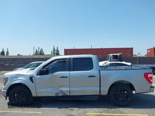2023 Ford F-150 XL with VIN 1FTEW1CP0PKG14886, listed as a IAAI auction lot 42444367 with 10,677 mi miles and . Bid and sale history available at DreamBid. Image 14.