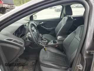 2014 Ford Focus Titanium with VIN 1FADP3N20EL329415, listed as a Copart auction lot 60881115 with 97,382 mi miles and Salvage title. Bid and sale history available at DreamBid. Image 7.