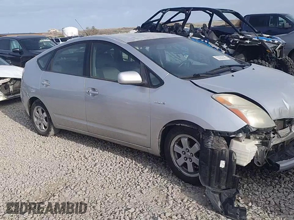 2007 Toyota Prius z VIN JTDKB20U473251436, wystawiony jako Copart lot #52282085 z przebiegiem Nie podano mil oraz Szkoda całkowita • Salvage title. Historia ofert i sprzedaży dostępna na DreamBid. Obrazek 10.