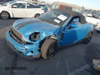 2013 MINI Roadster S z VIN WMWSY3C55DT594628, wystawiony jako IAAI lot #41316950 z przebiegiem 77 399 mil mil oraz . Historia ofert i sprzedaży dostępna na DreamBid. Obrazek 17.