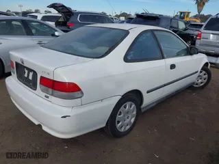 1999 Honda Civic DX with VIN 1HGEJ6220XL050962, listed as a IAAI auction lot 41188298 with 181,595 mi miles. Bid and sale history available at carsss.com. Image 4.