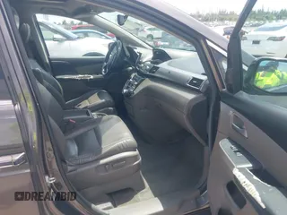 2012 Honda Odyssey Touring with VIN 5FNRL5H90CB088536, listed as a IAAI auction lot 42102008 with 283,350 mi miles and . Bid and sale history available at DreamBid. Image 5.