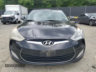 2013 Hyundai Veloster w/Gray Int z VIN KMHTC6AD2DU106887, wystawiony jako Copart lot #58149635 z przebiegiem 159 914 mil mil oraz Szkoda całkowita • Salvage title. Historia ofert i sprzedaży dostępna na DreamBid. Obrazek 5.