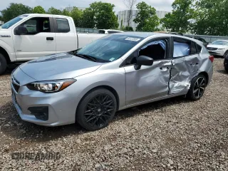 2018 Subaru Impreza with VIN 4S3GTAA65J3750251, listed as a Copart auction lot 60123865 with 129,652 mi miles and Salvage title. Bid and sale history available at DreamBid. Image 1.
