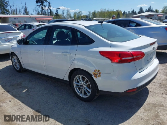 2016 Ford Focus SE with VIN 1FADP3F22GL272491, listed as a IAAI auction lot 42042160 with 140,355 mi miles. Bid and sale history available at carsss.com. Image 3.