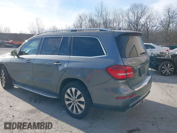 2018 Mercedes-Benz GLS with VIN 4JGDF6EE7JB098694, listed as a IAAI auction lot 41294697 with 104,807 mi miles. Bid and sale history available at carsss.com. Image 3.