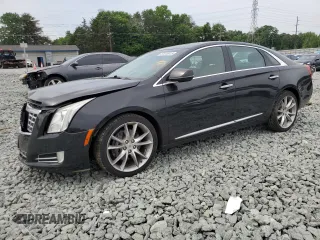 2013 Cadillac XTS Premium z VIN 2G61S5S37D9169935, wystawiony jako Copart lot #57515415 z przebiegiem 122 144 mil mil oraz Szkoda całkowita • Salvage title. Historia ofert i sprzedaży dostępna na DreamBid. Obrazek 1.