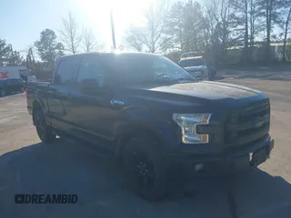 2015 Ford F-150 XLT with VIN 1FTEW1E86FFC00959, listed as a IAAI auction lot 41581711 with 130,298 mi miles. Bid and sale history available at carsss.com. Image 1.