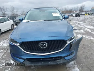 2020 Mazda CX-5 Grand Touring with VIN JM3KFBDM2L0778831, listed as a IAAI auction lot 41739655 with 72,533 mi miles. Bid and sale history available at carsss.com. Image 13.