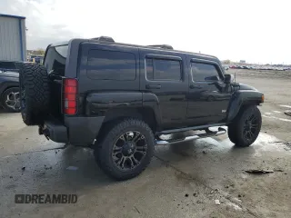 2006 Hummer H3 with VIN 5GTDN136368270240, listed as a Copart auction lot 84197454 with 209,268 mi miles and Salvage Title. Bid and sale history available at DreamBid. Image 3.