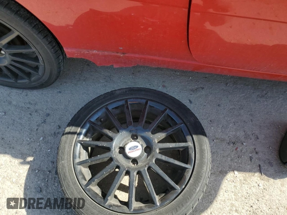 2007 Ford Focus S with VIN 1FAHP31N17W155180, listed as a Copart auction lot 48991395 with 210,400 mi miles and Salvage Title. Bid and sale history available at DreamBid. Image 12.