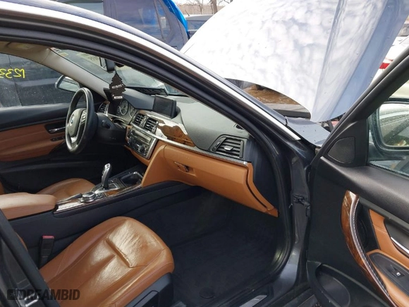 2014 BMW 3 Series 335i xDrive with VIN WBA3B9C53EF588061, listed as a IAAI auction lot 41652035 with 123,345 mi miles. Bid and sale history available at carsss.com. Image 5.