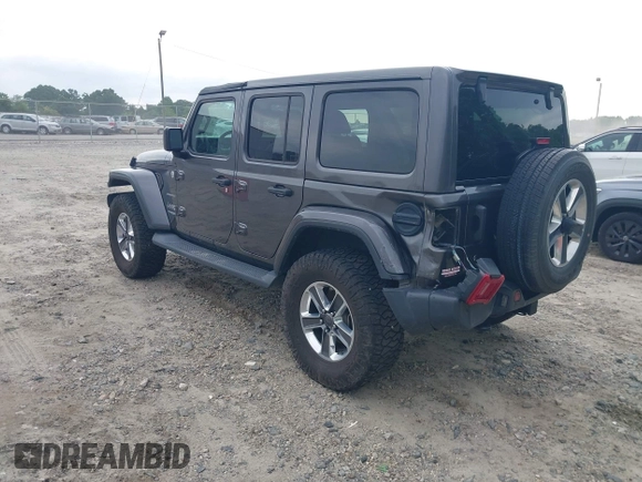 2018 Jeep Wrangler Unlimited Sahara with VIN 1C4HJXEN8JW303023, listed as a IAAI auction lot 42138631 with 72,463 mi miles and . Bid and sale history available at DreamBid. Image 3.