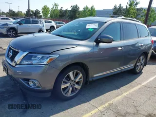 2015 Nissan Pathfinder Platinum with VIN 5N1AR2MN8FC693981, listed as a IAAI auction lot 42145556 with 161,142 mi miles and . Bid and sale history available at DreamBid. Image 2.