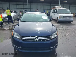 2014 Volkswagen Passat Wolfsburg Ed with VIN 1VWAT7A3XEC085932, listed as a IAAI auction lot 41567573 with 165,154 mi miles. Bid and sale history available at carsss.com. Image 6.