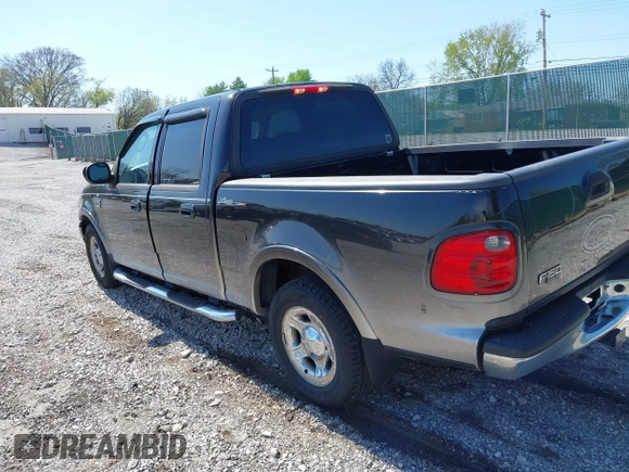 2003 Ford F-150 XLT with VIN 1FTRW07653KC18900, listed as a IAAI auction lot 41979710 with 99,525 mi miles. Bid and sale history available at carsss.com. Image 3.