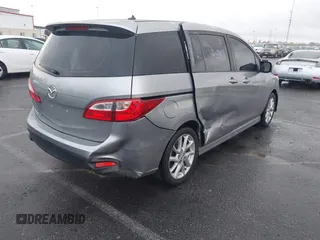 2012 Mazda 5 Touring с VIN JM1CW2CLXC0126576, выставлен на аукционе IAAI как лот 41759917 с пробегом 144 596 миль миль и . История ставок и продаж доступна на DreamBid. Изображение 4.