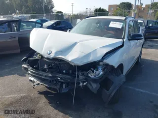 2014 BMW X1 xDrive28i with VIN WBAVL1C52EVY23658, listed as a IAAI auction lot 41153436 with 26,791 mi miles. Bid and sale history available at carsss.com. Image 18.